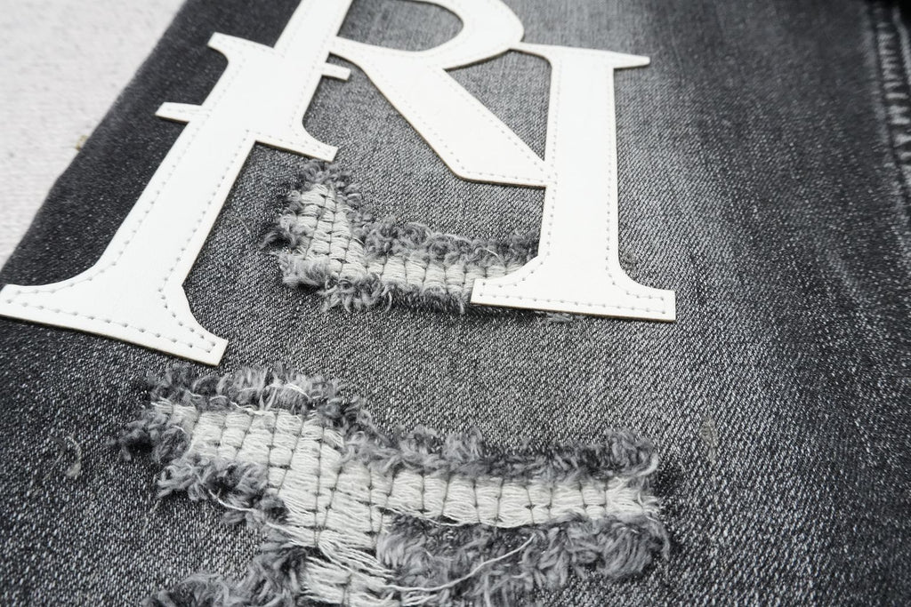 AMIRI BLACK WITH WHITE WRITTING