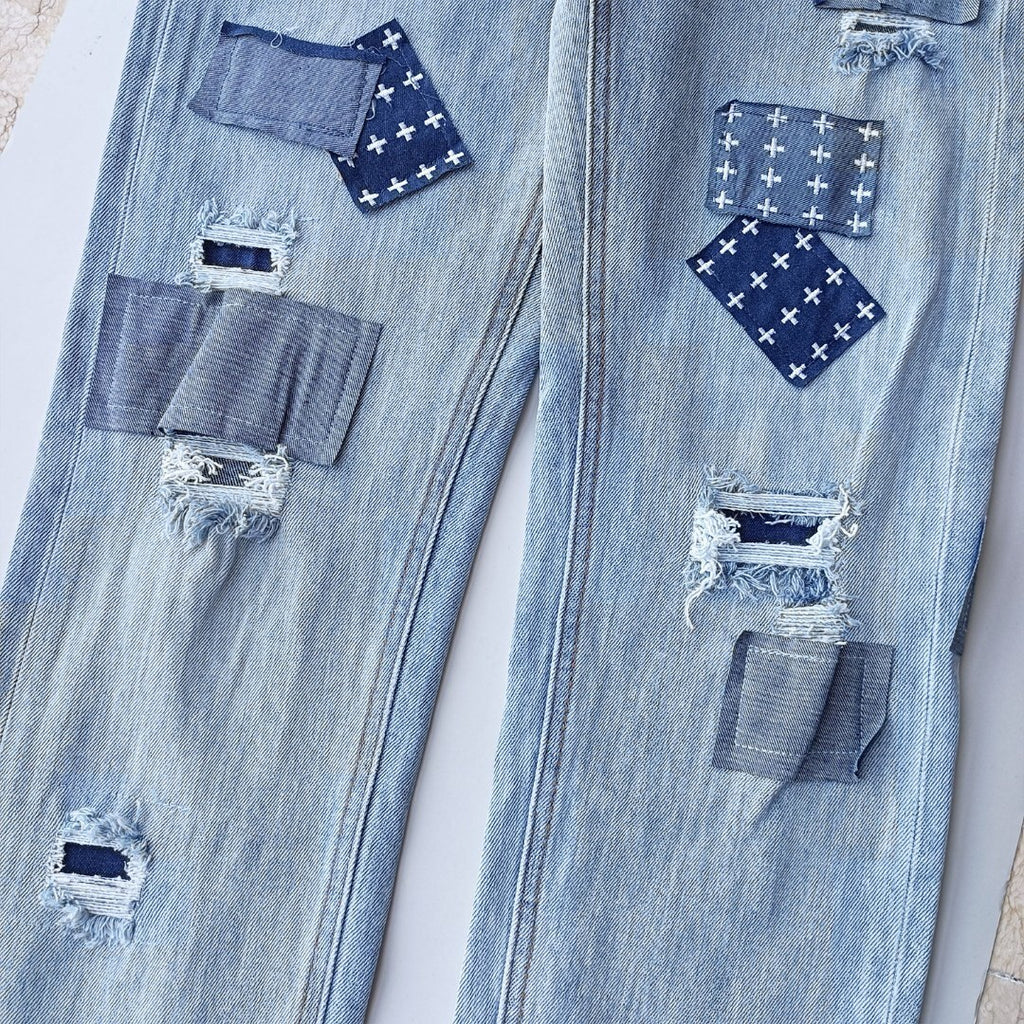 KSUBI BLUE RIPPED JEANS WM35