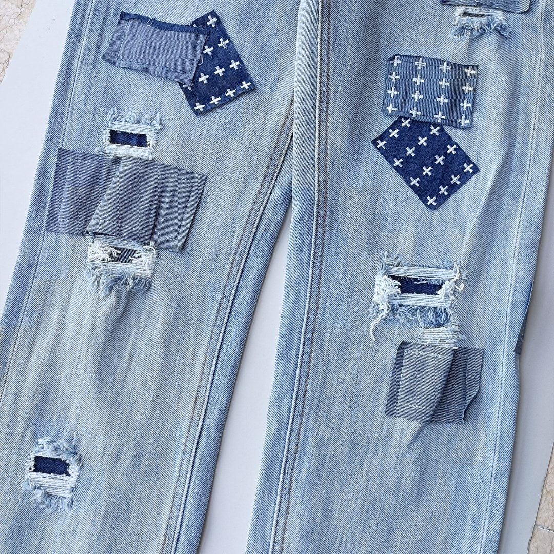 KSUBI BLUE RIPPED JEANS WM35