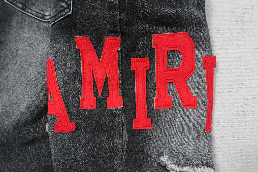 AMIRI BLACK WITH RED WRITTING