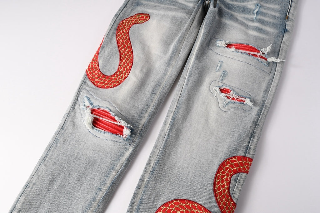 AMIRI RED SNAKE BLUE JEANS