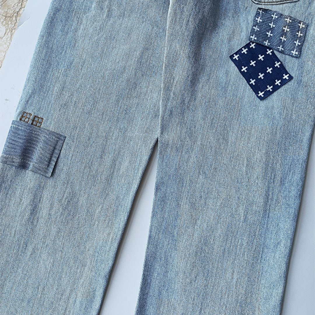 KSUBI BLUE RIPPED JEANS WM35