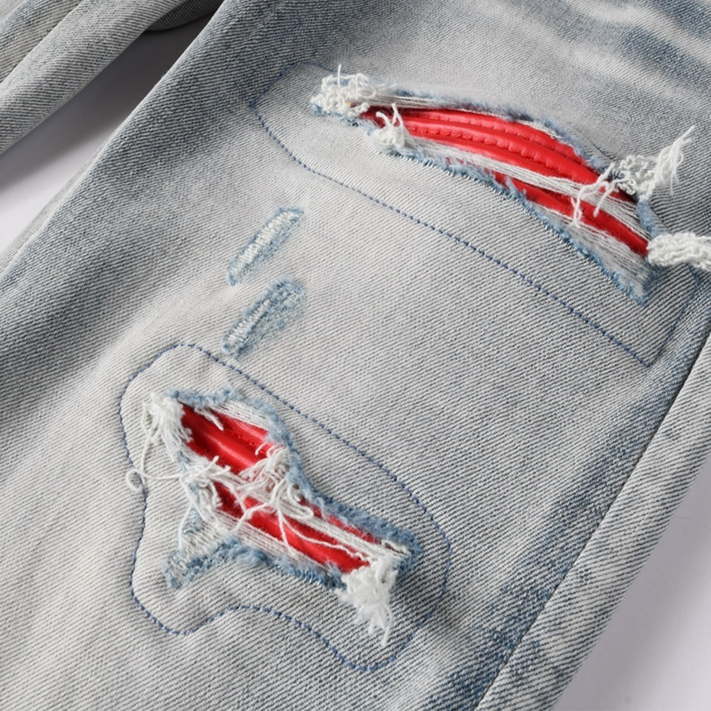 AMIRI RED SNAKE BLUE JEANS