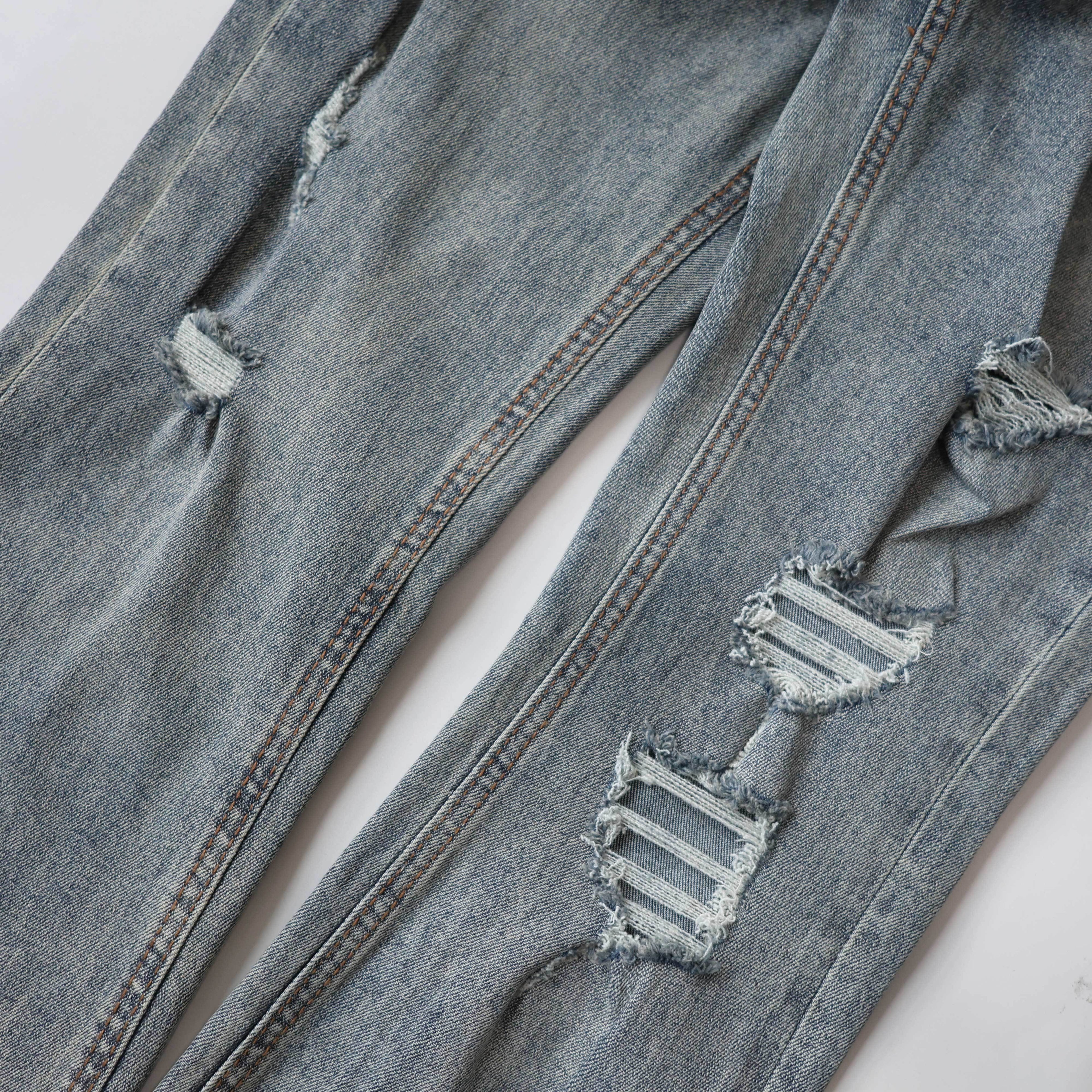 KSUBI BLUE RIPPED JEANS WM173